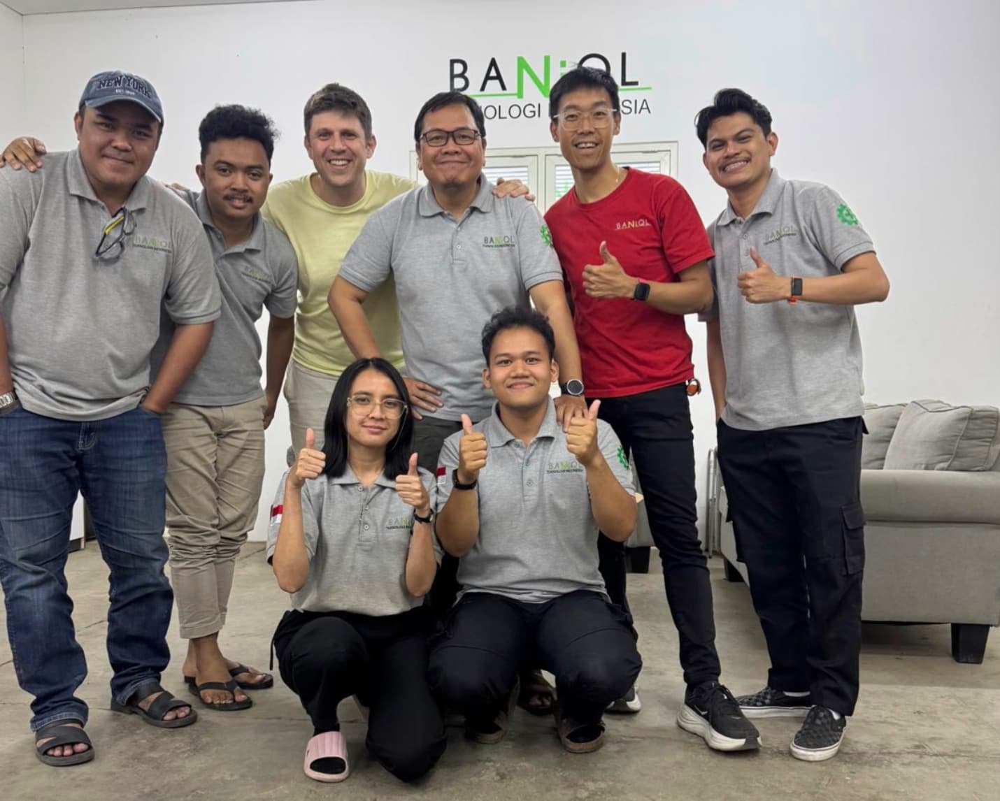 Alex Miller with the Baniql team after an AI workshop in Indonesia